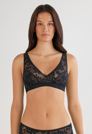 Zwarte kanten bralette met bloemenpatroon, V-hals en geschulpte rand. Doorzichtig materiaal en draadloos ontwerp voor comfort.