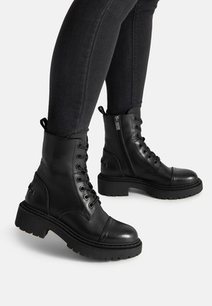 BADURA, Stivaletti con plateau - black