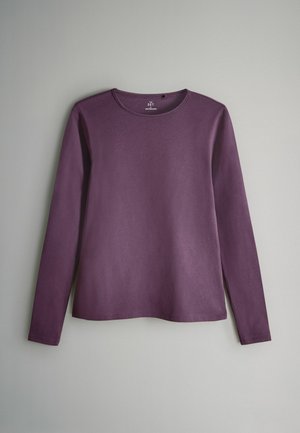 Long-sleeve purple shirt in soft fabric, featuring a round neckline and a relaxed fit. Simple design with no visible patterns or accents.