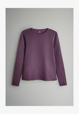 Long-sleeve purple shirt in soft fabric, featuring a round neckline and a relaxed fit. Simple design with no visible patterns or accents.