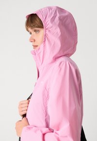 Tommy Jeans OUTDOOR JACKET - Summer jacket - carnival pink