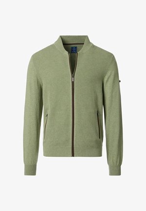 Hellgrüner Reißverschluss-Pullover mit strukturiertem Strickmuster, Stehkragen und braunen Reißverschlussdetails. Mit seitlichen Taschen.