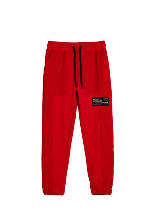 - Spodnie treningowe