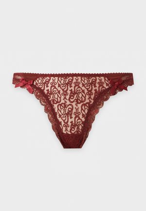 Culotte bikini en dentelle bordeaux avec motifs floraux et bords festonnés, ornée de petits nœuds en satin de chaque côté.