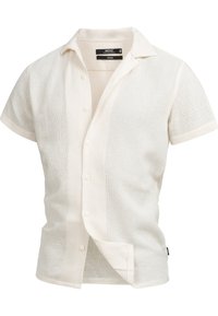 Short-sleeve, button-up shirt crafted from lightweight, textured fabric in off-white, featuring a standard collar and a slight bottom hem.