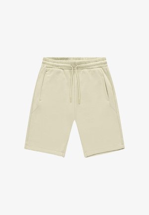 Lichtbeige korte broek gemaakt van zachte stof, met een elastische tailleband met trekkoord, zijzakken en een recht model.