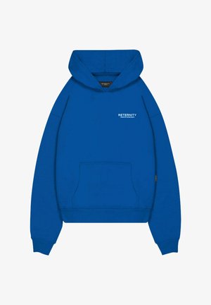 Modra kapuca s sprednjim žepom, rebrastimi manžetami in robom. Na prsih ima bel napis "RETERNITY CREATIVE DEPARTMENT". Narejena iz bombaža.