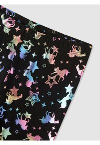Leggings neri con un motivo olografico di unicorni e stelle in colori pastello. Vita elastica, tessuto liscio e design vivace.