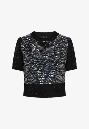 Melnā īsajā piedurknē džemperī ir sekvenču rotājums, ribota apkakle un apakšmala, kā arī dekoratīvs loku elements priekšpusē.