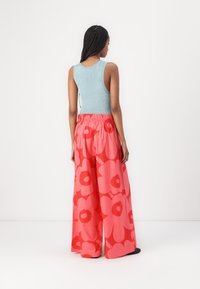 Marimekko VOIMAKUKKA UNIKKO - Pantaloni - red/pink