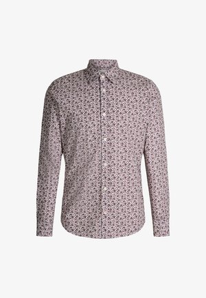 Koszula z długim rękawem zapinana na guziki, z białym tłem i małymi czerwonymi wzorami kwiatowymi. Wykonana z lekkiego materiału z klasycznym kołnierzykiem.