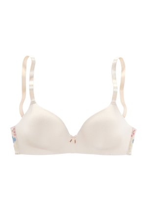 Soutien-gorge rembourré beige avec un tissu lisse, des bretelles en satin réglables, des broderies florales sur les côtés et un petit nœud au centre avant.