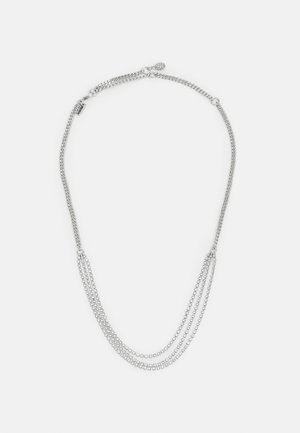 Hopeaketju hopeanväristä, jossa on kolme kerrosta. Ominaisuuksina monimutkaiset ketjutyylit ja turvallinen lukko. Liukas pinta, minimalistinen muotoilu.