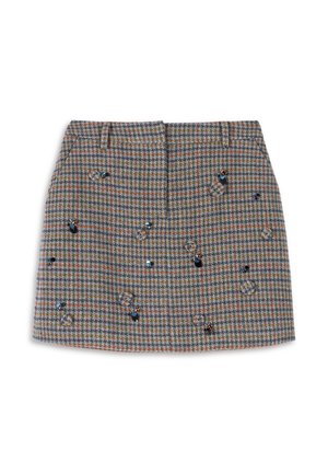 Geruit wollen minirok in bruin-, blauw- en groentinten, met decoratieve pailletten en een gestructureerd silhouet. Twee steekzakken aan de voorkant.