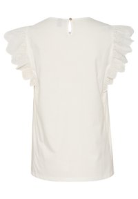 Top de algodón blanco con mangas de volantes de ojales, detalle de abertura en la parte trasera y un corte relajado. Textura suave con delicados acentos en las mangas.