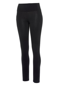 Schwarze Leggings mit hohem Bund, aus einem weichen Material gefertigt, mit seitlichen Taschen und einer glatten Textur, entworfen für eine figurschmeichelnde Silhouette.