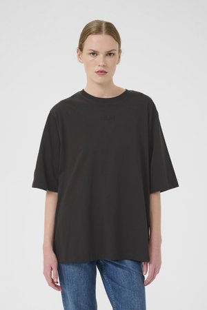 Black oversized T-shirt made of cotton with a round neckline. Features a subtle logo detail on the chest and slightly rolled sleeves.