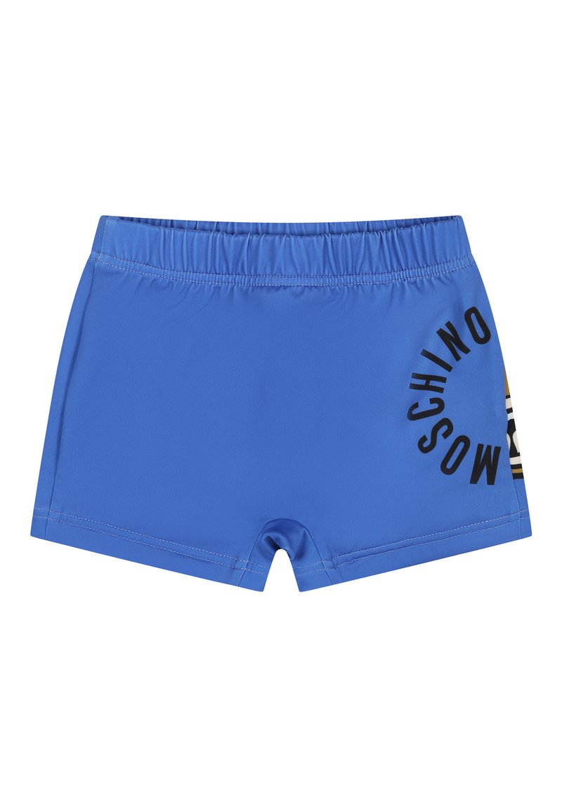 Pantaloni da bagno blu in tessuto liscio, dotati di un elastico in vita e con il logo nero "MOSCHINO" stampato sul lato.