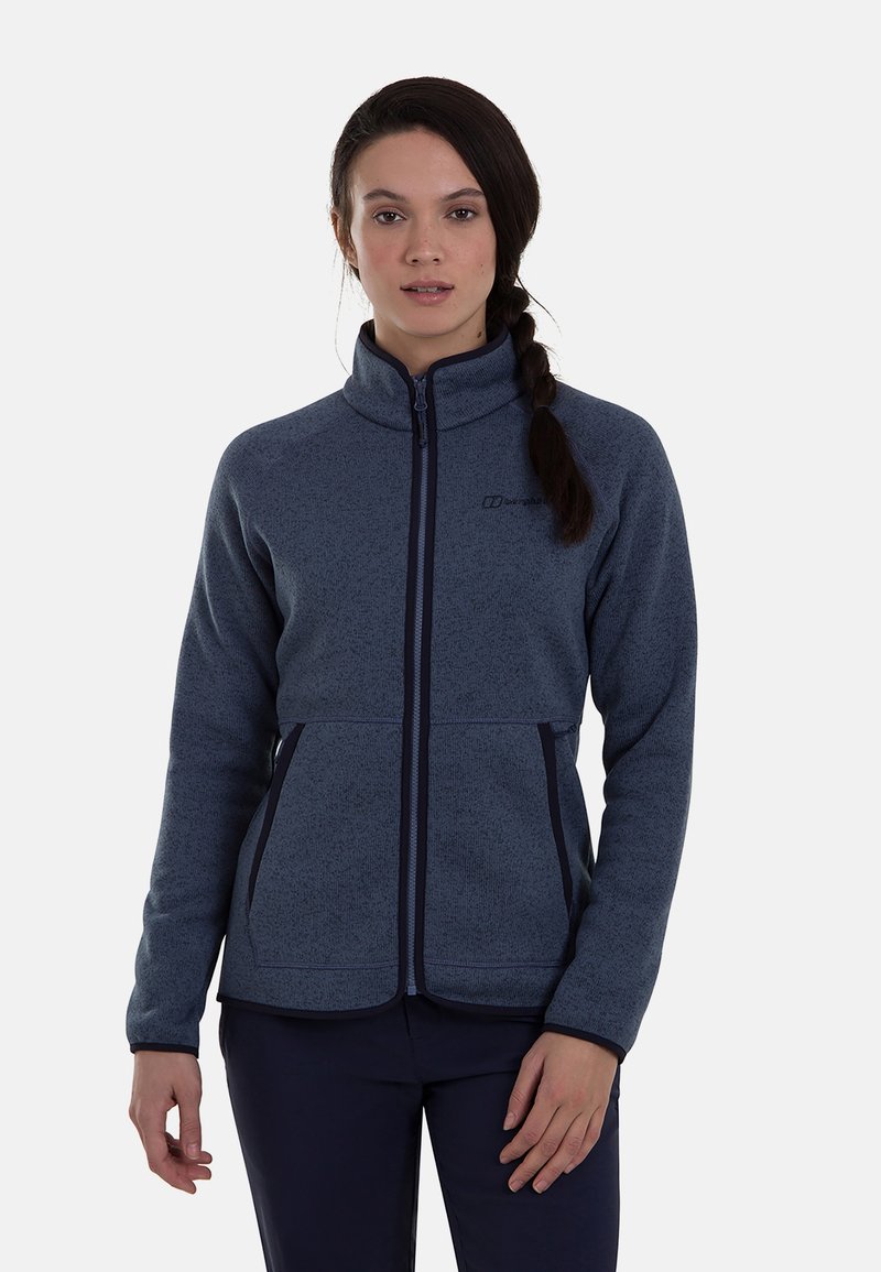 Mid-zip fleece jack in donkerblauw, textiel met structuur, met twee voorzakken en contrasterende marineblauwe rits en afwerking.