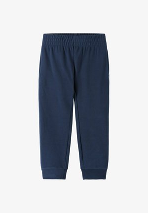 Dunkelblaue Jogginghosen aus weichem Baumwoll-Mix, mit einem elastischen Bund, seitlichen Taschen und ribbedelastischen Bündchen an den Knöcheln.