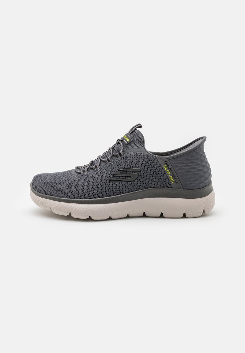 Gray athletic shoe featuring breathable mesh upper, lace-up design, and textured heel. White cushioning sole with a black accent logo.