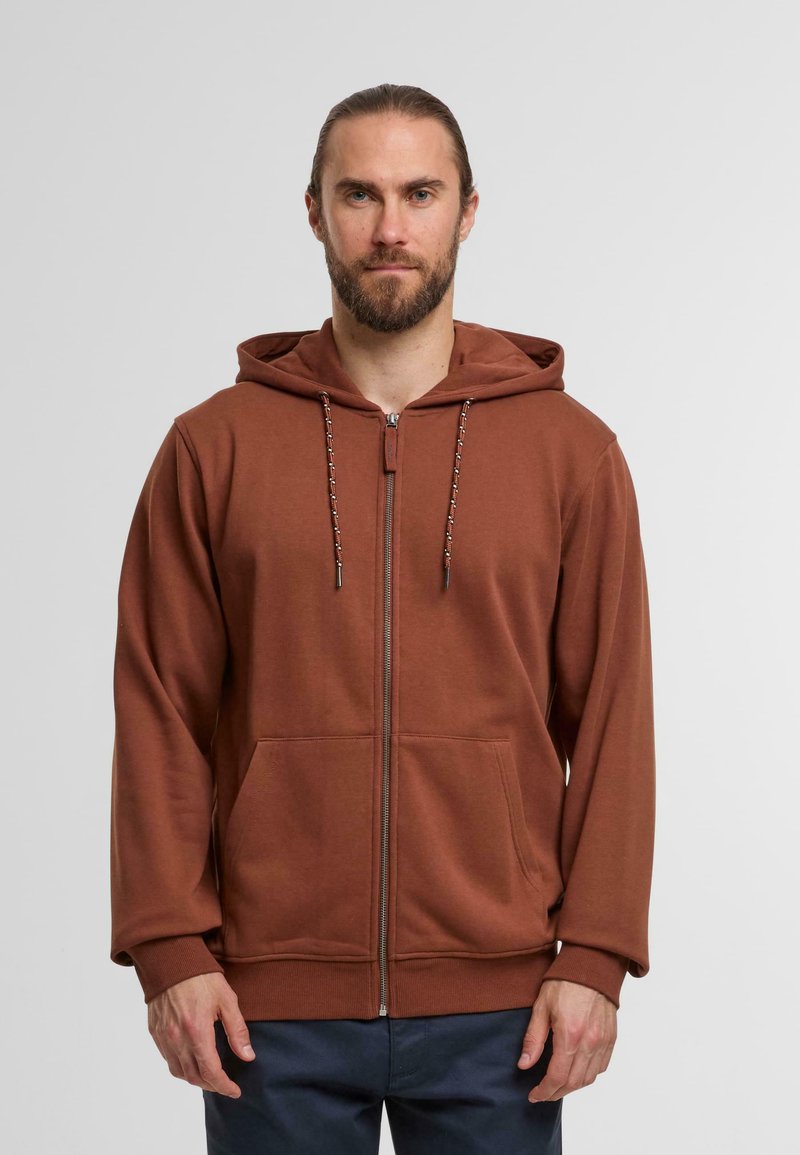 Brown zip-up hoodie with a kangaroo pocket, drawstring hood, and ribbed cuffs. Made from soft fabric, featuring a relaxed fit.