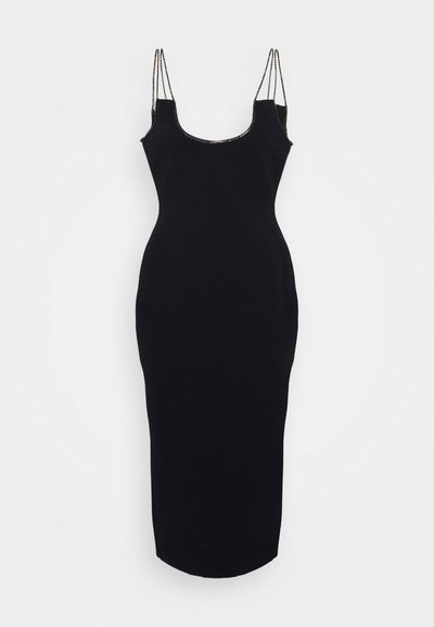 Mustmust õhuke kangas, kehasse ligi ulatuv lõige, ümmargune kaelus ja õhukesed rihmad, millel on metallist detailid.