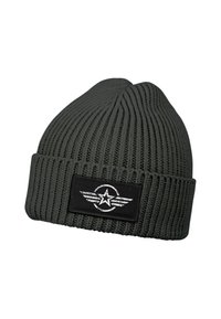 Gray knit beanie with ribbed texture, featuring a black rectangular patch with a white star and wing design. Close-fitting and stretchy.