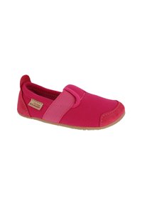 Pink slip-on shoe made of canvas with a smooth texture and suede accents. Features a rubber sole and overlapping color panels.