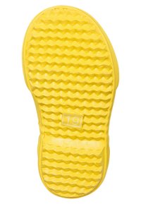 Semelle de chaussure en caoutchouc jaune présentant une texture ondulée, une forme arrondie et un "19" blanc tamponné sur la base plate.