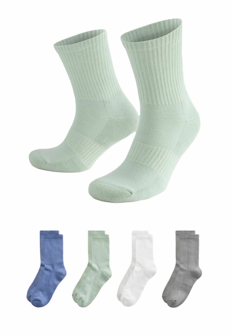 Calcetines de algodón verde claro con puños acanalados y refuerzo en el talón y en la puntera. Cuatro colores adicionales: azul, verde más oscuro, blanco y gris.