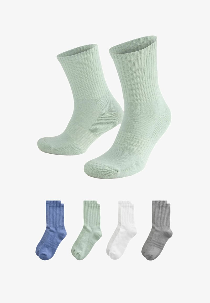 Calcetines de algodón verde claro con puños acanalados y refuerzo en el talón y en la puntera. Cuatro colores adicionales: azul, verde más oscuro, blanco y gris.