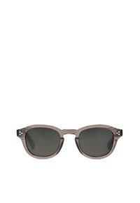 Gray plastic sunglasses with rounded edges, dark lenses, and small decorative rivets on the temple. Lightweight and modern silhouette.