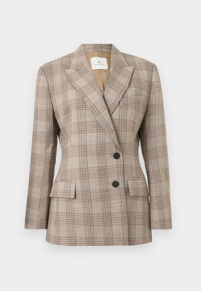 Beige kariertes Sakko mit gekerbtem Revers, zwei schwarzen Knöpfen, Pattentaschen und strukturierter, maßgeschneiderter Passform.