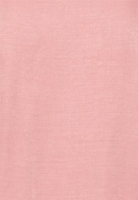 Tecido de linho rosa com uma aparência suave e texturizada, apresentando variações subtis na trama e na cor por toda a superfície.