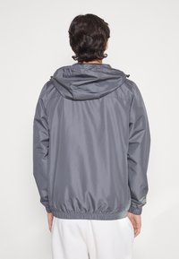 Ellesse TERRAZZO JACKET - Corta-vento - dark grey