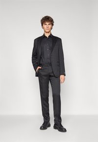 KARL LAGERFELD TROUSERS COSMOS - Suit trousers - black