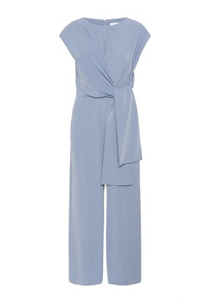 Light blue jumpsuit with cap sleeves, loose fit, and a tied waist detail. Made from smooth fabric with a straight leg design.