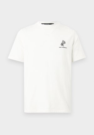 Bela majica s kratkimi rokavi, z majhnim črnim logotipom palme in napisom "KARL LAGERFELD" na levi strani prsnega koša, okrogel izrez na vratu.