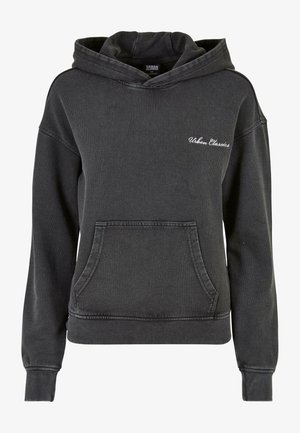 Must mustrikest kašmiiri segu jooder, millel on känguru tasku, soonikkoes varrukad ja äär. Sisaldab valget broderitud "Urban Classics" logo rinnal.