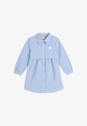 Abito camicia a righe blu e bianche con maniche lunghe, colletto, chiusura con bottoni e ricamo di margherita bianca sul petto.