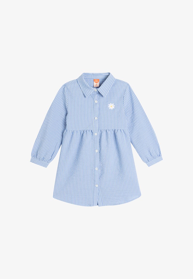 Abito camicia a righe blu e bianche con maniche lunghe, colletto, chiusura con bottoni e ricamo di margherita bianca sul petto.