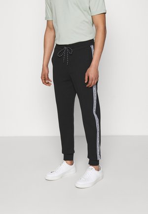 BLOCKED LOGO - Pantaloni sportivi - black
