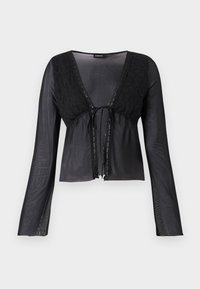 Zwarte, doorzichtige blouse met lange mouwen, kantdetail op de schouders, een trekkoord halslijn en een iets cropped pasvorm.