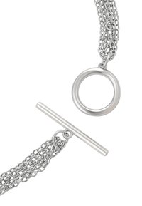 Bracciale in argento con maglie rotonde e un fermo a barra, con dettagli intricati della catena, texture liscia e finitura lucida.