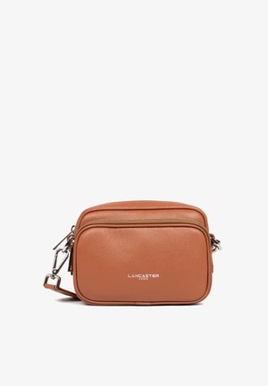 Textured brown leather crossbody bag with two zip compartments, silver hardware, and embossed logo on the front. Adjustable strap.