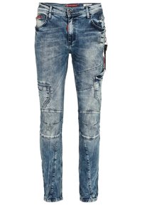 Lichtblauwe spijkerbroek met een slim fit, voorzien van gestikte paneelaccenten, meerdere zakken en versleten details. Inclusief een ritssluitingszak op de zij.