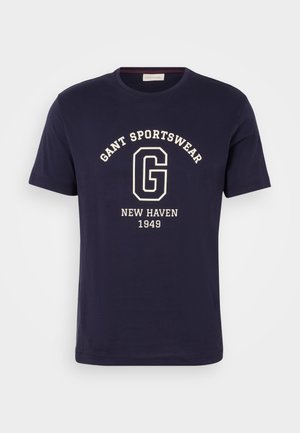 Navy Baumwoll-T-Shirt mit einem weißen Grafikdruck, auf dem "GANT SPORTSWEAR", "NEW HAVEN" und "1949" steht. Rundhalsausschnitt und kurze Ärmel.