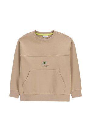 Beżowa bluza crewneck z przednią kieszenią kangurka i małym graficznym logo nad kieszenią z napisem „achieve.”