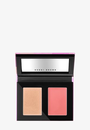 Kompakte Make-up-Palette mit einem beigen Highlighter und einem rosa Creme-Rouge, mit einem rechteckigen Spiegel, der "Bobbi Brown" trägt.